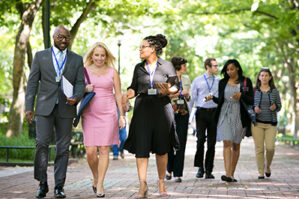 Executives walking on Penn's Locust Walk