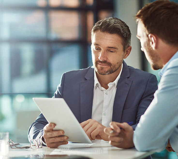 man advising in office setting